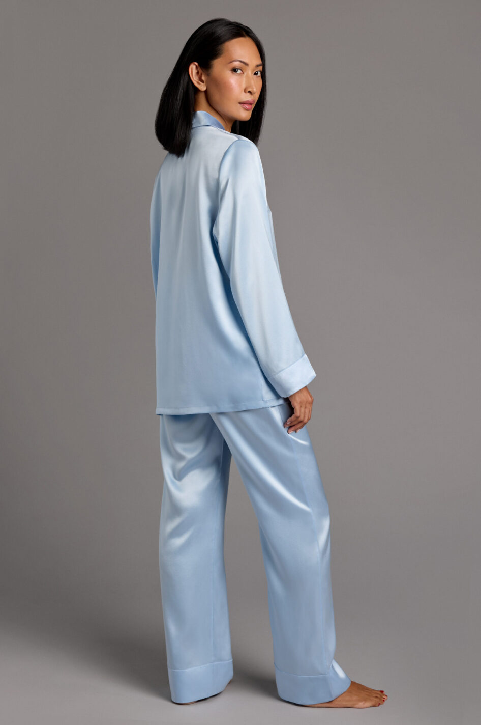 Close-up of Mulberry silk fabric showing smooth texture of light blue pyjamas